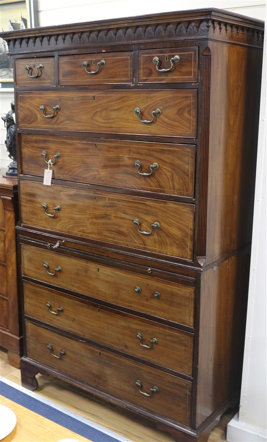 A George III mahogany chest on chest, line-inlaid, with brushing slide, 185cm high